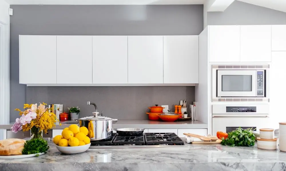 Spotless white kitchen after a move-out deep cleaning